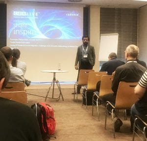 Sowmyan Rajagopalan presenting on schematic porting and analog migration at CDNLive 2018